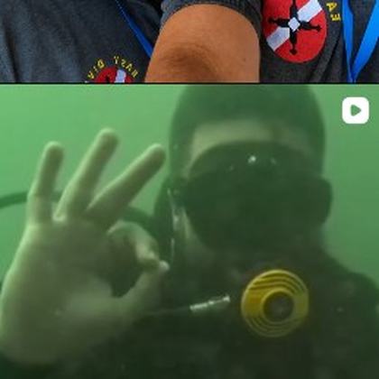 Mergulhador fazendo sinal de OK debaixo d'água no Lago Paranoá